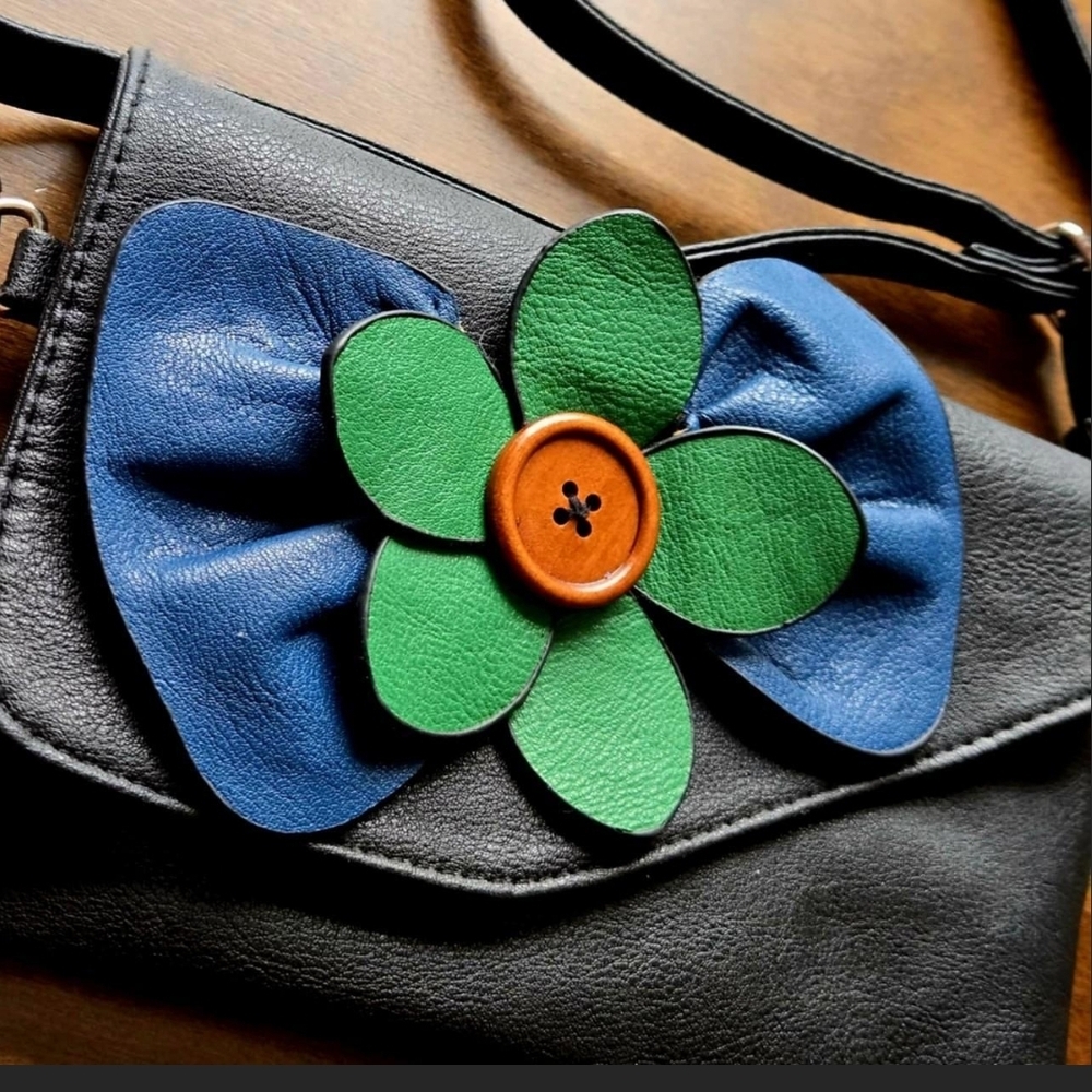 Black Leather Crossbody Bag with Blue Bow & Green Flower Accent